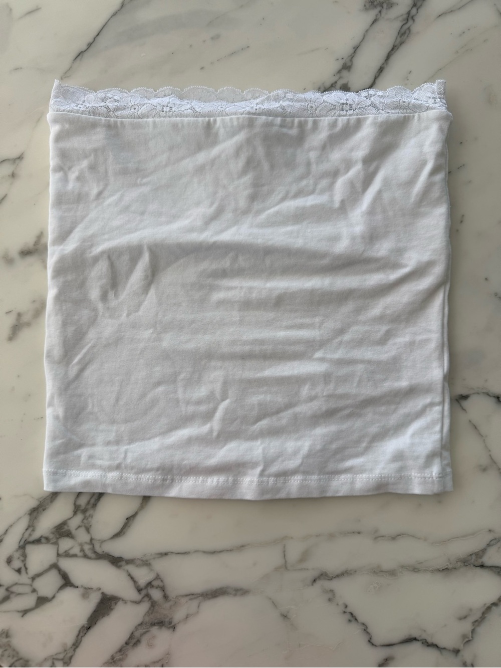 Subdued Sleeveless White Lace Top